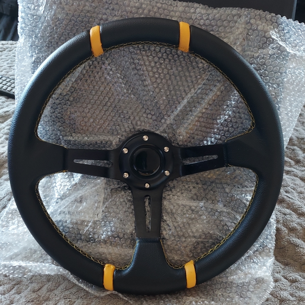 Brand new, still in the box steering wheel